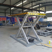 Plateforme élévatrice à ciseaux électrique Xinchaoyue, table de travail robuste avec capacité de charge de 500 kg à 50 000 kg pour travaux de construction en hauteur
