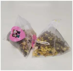 Otomatik üçgen piramit şekilli çay poşeti paketleme makinesi naylon PLA ipek çay poşeti paketleme makinesi bitkisel yaprak Teabag paketleme makinesi