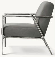 Fauteuil de salon moderne américain durable pour hôtel, chaise longue en tissu avec support en métal argenté, fauteuil de loisirs