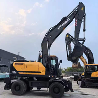 Excavatrice sur pneus Hyundai R210W-9 d'occasion 100% coréenne, 21 tonnes, avec moteur Cummins, pompe et PLC, modèle 2023, équipement pour travaux de terrassement