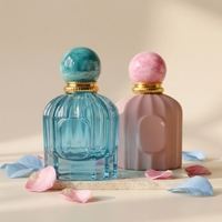 Flacon de parfum élégant en verre bleu clair de luxe haut de gamme de 100 ml, personnalisé, par Anding Supplier