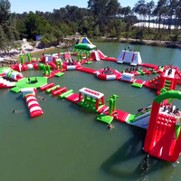 Parc aquatique gonflable commercial en PVC avec toboggan géant, trampoline et parcours d'obstacles - Parcs marins gonflables