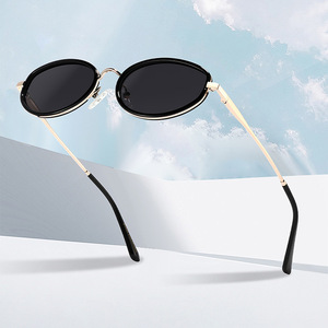 Gafas de sol de moda con montura pequeña para mujer, estilo ojo de gato ovalado, UV400, polarizadas, ligeras, montura de metal TR, lentes TAC, hechas en Wenzhou - Product Image 3