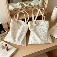 Pochette en dentelle élégante de luxe avec logo personnalisé, sac à bijoux personnalisé pour emballage cadeau de mariage, petit sac mini