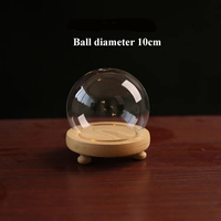 Clochette en forme de boule transparente, dôme de verre avec base en bois