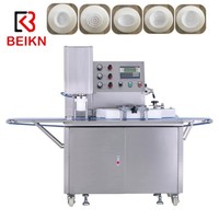 Machine à encroûter et à remplir Maamoul remplie de date Machine à estamper la ligne de production Mooncake pour les biscuits Maamoul