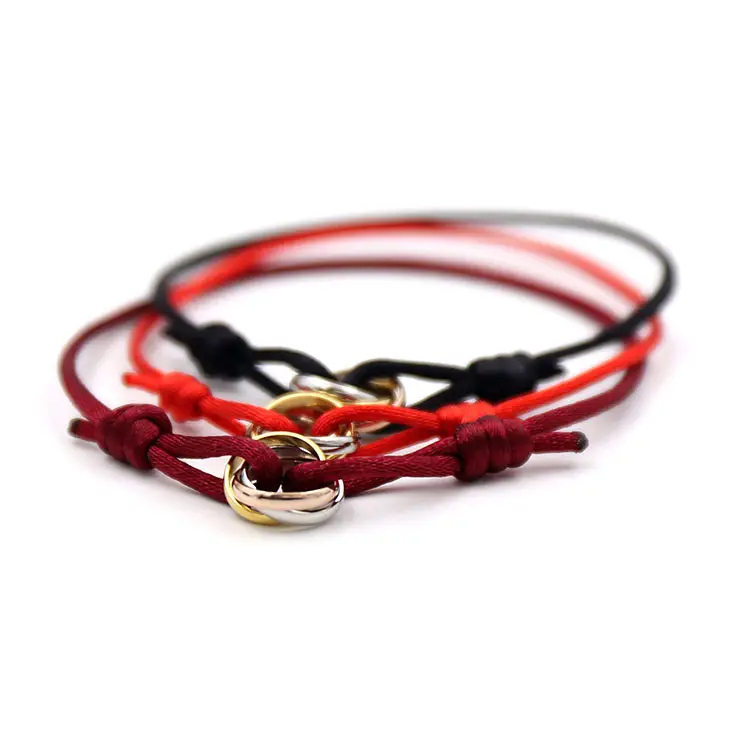 Bracelet de corde coloré tissé à la main trois boucles d'anneau accessoires de bijoux Bracelet porte-bonheur rouge rose Style de Couple en acier inoxydable