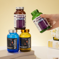 Bouteilles de capsules pharmaceutiques en gros 100 ml 200 ml 250 ml Bouteille en verre pour vitamines Couleur dégradée OEM Capsule cosmétique Complément alimentaire