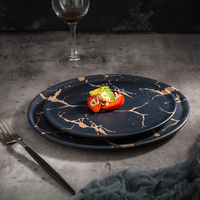 Assiette ronde en mélamine noire marbrée pour restaurant, nouveau design, vente en gros