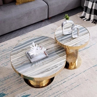 Table basse ronde de luxe italienne pour villa, salon moderne, combinaison table basse en métal et plateau en roche