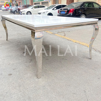 Table à manger rectangulaire en métal chromé argenté pour la fête