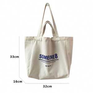 Sac fourre-tout en toile de coton réutilisable personnalisé avec logo imprimé pour le sport et le style de vie actif pour la salle de sport - Product Image 2