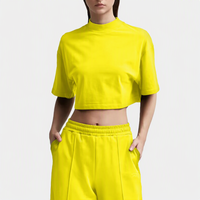 Crop top femme 100% coton noir uni, col roulé, épaules tombantes, haut court à col haut