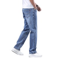Jean en denim bleu haut de gamme pour homme, coupe droite, taille mi-haute, nouvelle collection automne, délavage moyen, extensible, décontracté, avec boutons sur le devant