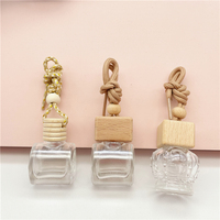 En gros 8ml diffuseur de désodorisant vide givré voiture suspendus bouteilles de parfum avec bouchon en bois