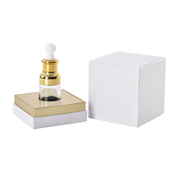 Impression de logo personnalisé 10ml 30ml 50ml 100ml Mini petite boîte d'emballage en carton de luxe pour parfum cosmétique avec couvercle et base