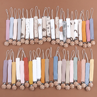 Vente en gros de chaîne de sucette pour bébé multicolore en pur coton avec logo personnalisé de sécurité avec clip en bois