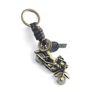 2024 Motorcycle Leather woven key pendant retro bag metal pendant key chain