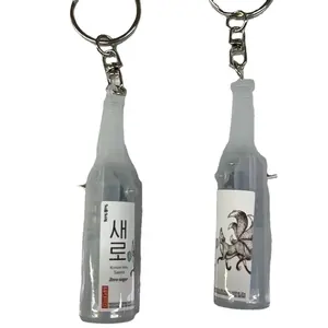 Logo polychrome matière plastique ABS 7.8*1.8cm mini lampe de poche led forme de bouteille de bière porte-clés projection logo porte-clés