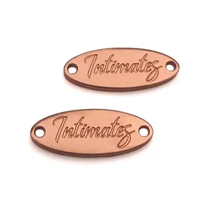 Fashionable Elliptical Shape Die Casting Metal Engraved Logo Brand Name Clothing Sewing Tags For Mixatch
