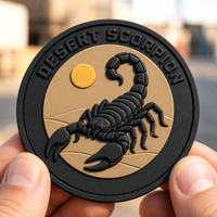 Fabricant en gros de patchs en caoutchouc souple en silicone PVC avec logo en relief 2D 3D personnalisé pour vêtements