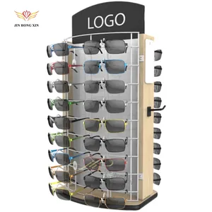 وحدات عرض نظارات شمسية أنيقة مركبة على الحائط أثاث خشبي متجر نظارات شمسية تصميم محل بيع بالتجزئة