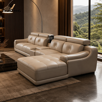 Canapé modulaire en cuir véritable beige, moderne, en forme de L, avec fauteuil inclinable électrique, console centrale, éponge écologique, personnalisable OEM, pour concessionnaires