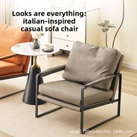 Fauteuil de détente individuel en métal, style minimaliste et luxueux, avec accoudoirs, design moderne pour hôtel et salon