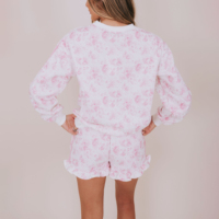 Ensemble décontracté deux pièces pour femme : Sweat-shirt rose à pois col rond et short à volants – Design élégant, vente en gros