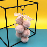 Porte-clés créatif en peluche en forme de pamplemousse, pendentif mignon pour sac, avec nœud en dentelle et boule de fourrure, pour clés de voiture