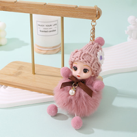 Nouvelle mode, adorable porte-clés poupée bébé en peluche avec pompon, Kawaii, grands yeux, 3D, doux, moelleux, écologique, portable, cadeau pour fille