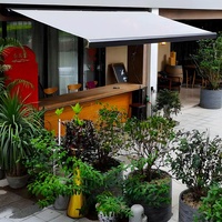 Store banne rétractable automatique robuste en aluminium avec cassette intégrale en HDPE pour terrasse extérieure