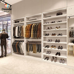 Modern Stainless Steel Clothing Display Racks | Wall-Mounted Garment Cabinets & Boutique Island Stands - Product Image 1