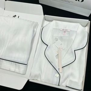 Ensemble de pyjamas boutonnés en satin de soie à imprimé floral pour femmes vêtements de nuit à taille élastique avec poche vêtements de nuit confortables