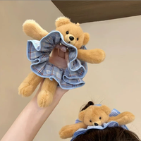 Bandeau pour cheveux en forme d'ours pour filles avec un design en peluche mignon. Un accessoire pour cheveux en queue de cheval longue. Un accessoire capillaire polyvalent