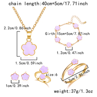 Lot de 5 Pièces : Nouvelle Parure Collier Or INS Fleur à Cinq Trèfles Bracelet Boucles d'Oreilles Bagues Joncs Bijoux Vert et Noir Tendance Femme Cadeaux