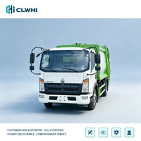 Camion compacteur de déchets HOWO 4x2 de 7000L, carrosserie verte, camion de collecte des ordures pour usage urbain, vente directe d'usine
