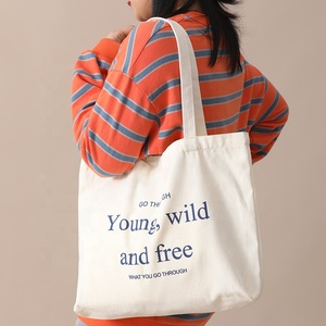 Grand sac fourre-tout en toile rayée avec citation inspirante, en coton écologique, idéal pour les étudiants, les trajets quotidiens et le shopping - Product Image 3