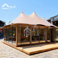 Tente commerciale modulaire BABERY à structure en acier à trois pôles pour café, restaurant et lodge en plein air, idéale pour la restauration en station balnéaire