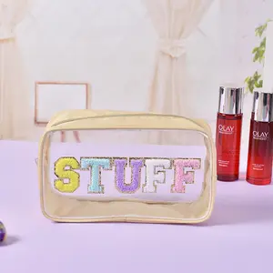 Sac cosmétique transparent pour femmes Sac de maquillage à fermeture éclair imperméable en PVC avec lettres et écussons