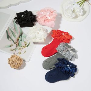 Adorables chaussettes pour bébé fille avec dentelle à volants et nœud, en coton doux, écologiques et respirantes, détails en perles, vente en gros - Product Image 1