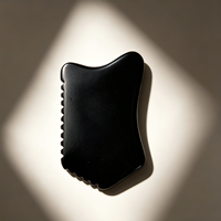 Planche de massage Gua Sha en pierre de Bian noire naturelle avec logo personnalisé pour le visage et le corps, outil de beauté amincissant et de raclage