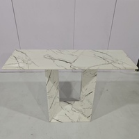 Table à manger rectangulaire effet marbre blanc avec base trapézoïdale
