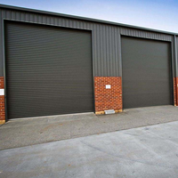Porte à enroulement en acier robuste avec fonction antivol, porte roulante industrielle Qianou pour entrepôt, usine, prix bas