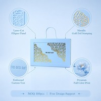 Boîte cadeau rigide personnalisée découpée au laser, motif floral bleu poudré avec feuille d'or, poignée en cordon torsadé, style livre