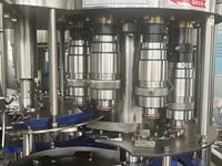 Machine de remplissage automatique de liquides pour ligne de production d'eau pure en bouteille PET
