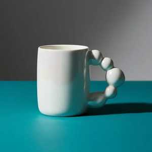 Mug en céramique moderne à effet bulle, finition vernie, idéal pour le café, le thé, le latte et les boissons chaudes, au meilleur prix. - Product Image 1