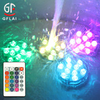 Producto de luz de piscina LED subacuática impermeable IR 24 teclas 16 colores con pilas Puck luces LED sumergibles con control remoto