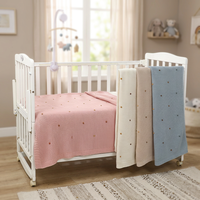 Couverture pour bébé en coton pur tricoté pour toutes les saisons avec décoration en pompon