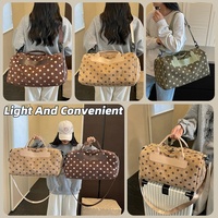 Sac de sport et de voyage grande capacité à motif pois avec logo personnalisé, compartiment à chaussures, poche sec/humide, poignée souple et fermeture éclair bidirectionnelle